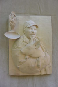 Image portrait d'un homme sculpture sur bois